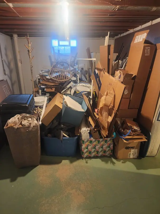 Roll-off dumpster container at job site for 2 Yard Dumpster Rental in Newington